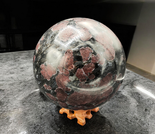 LARGE GARNET IN ARFVEDSONITE SPHERE 135MM+