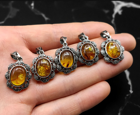 5 x Baltic Amber pendants